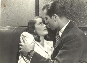 Nancy Guild and George Montgomery in The Brasher Doubloon (1947) Directed by John Brahm credit: 20th Centrury Fox